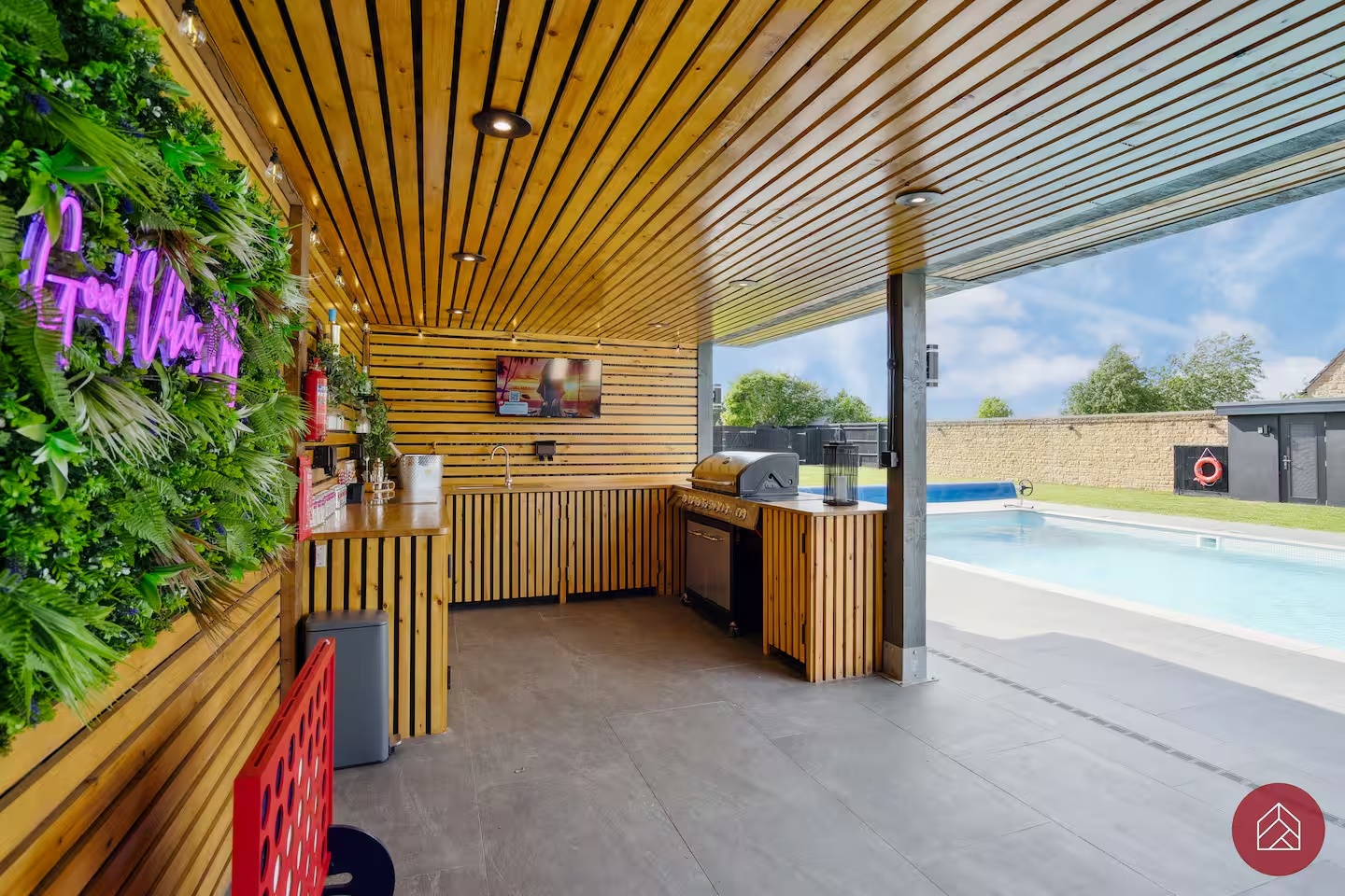 The private covered garden bar overlooking the swimming pool