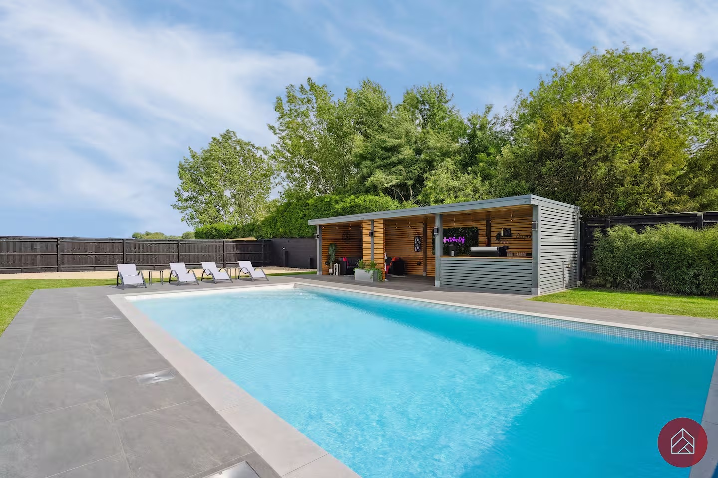 Private pool with loungers and covered garden bar
